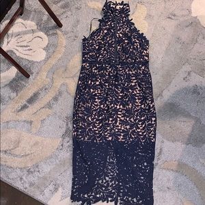 Navy blue lace dress, with blush underlay.